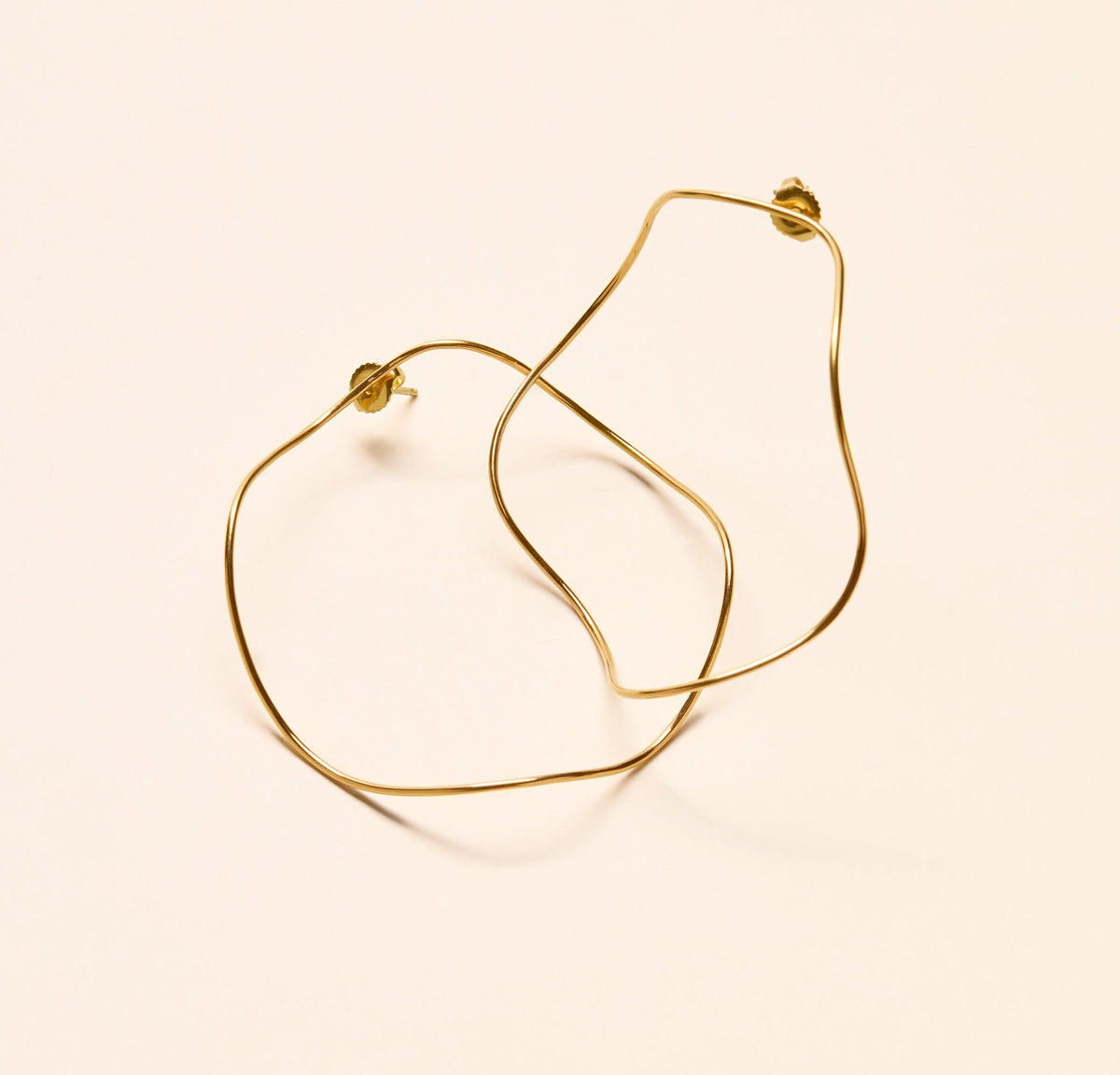 Boucles d'oreilles Waves grand modèle, fil rond 