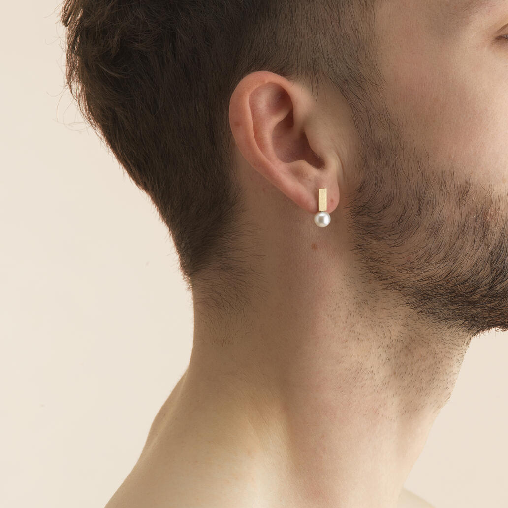 Boutons d'oreilles Babylone portées homme